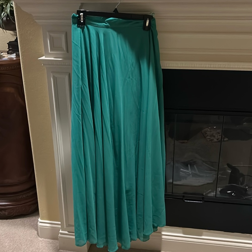 Green flowy skirt.